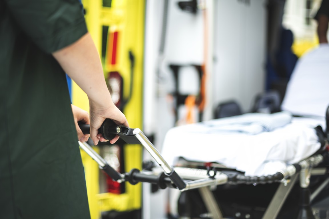 Paramedics at work with an ambulance